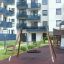 Single Swing (BNS 90cm) équipement de terrain de jeu avec siège de balançoire circulaire dans une aire de jeux résidentielle