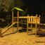 Triangle Modern Nature wooden playhouse with slide la nuit