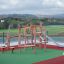 Structure de jeu en bois Etna avec cordes d’escalade et toboggan.