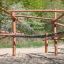 Équipement de jeu cabane en bois Sonora dans un cadre naturel