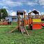 Aire de jeux avec Locomotive with cars train playhouse.