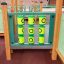 Epsilon inclusive playground panneau de jeu avec jeu de morpion.