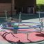 Bicycle merry-go-round équipement de terrain de jeu avec quatre sièges et des guidons