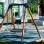 Bird Nest Single Swing (BNS 120 cm) installé dans une aire de jeux.