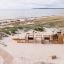 Majestic Modern Nature ship with slide aire de jeux sur une plage de sable