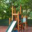 Tower with Slide structure de terrain de jeu en bois avec murs d'escalade et toboggan vert