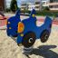 Car rocking dans le bac à sable de l’aire de jeux en zone résidentielle