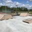 Skatepark avec Olly Box 3 par une journée ensoleillée.