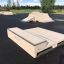 Rampe de skateboard Fun Box type 2 dans un skatepark extérieur.