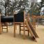 Maison de jeu en bois avec toboggans et activités d'escalade, Motor Function Center Nature.