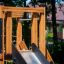 Challenger Nature aire de jeux en bois avec toboggan dans un jardin