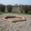 Sandbox with bark dans une aire de parc
