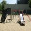 Structure de jeu Whale - AZTEC steel structure avec mur d’escalade et toboggan.