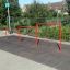 Structure de jeu en métal rouge Triple Somersault pour l’exercice en plein air des enfants
