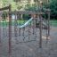 Yellowstone wooden playhouse filet d’escalade dans une aire de jeux