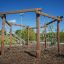 Yellowstone wooden playhouse structure d’escalade extérieure avec filet de corde