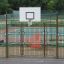 Panier de basket extérieur avec clôture de sécurité métallique - équipement de jeu Tiger.