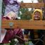 Enfants jouant sur Stranda wooden playhouse.