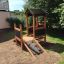 Maison de jeu en bois pour enfants avec mur d’escalade - Playhouse Nature.