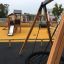 Knight's Castle Nature playhouse with slide dans une aire de jeux