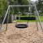 Silver Single Swing (BNS) dans une aire de jeux sur une surface sablonneuse