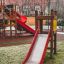 Toddler Tower Slide, équipement de jeu rouge avec toboggan et tour.
