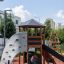 Structure de jeu Six Angle Aztec avec mur d’escalade et toboggan
