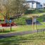 Équipement moderne d’aire de jeux extérieure Rules Tab dans un parc.