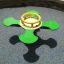 Vert Clover rocking sur la surface de l’aire de jeux