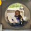 Enfant glissant sur le Locomotive with slide train playhouse.