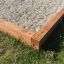 Oak Beam Section (running meter) utilisé comme bordure de bac à sable d'aire de jeux.