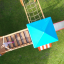 Des enfants jouent sur le Jubilee Unit castle with slide dans une aire de jeux.