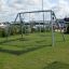 Swing Metal Frame (double swing) dans un parc près du front de mer