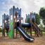 Terrain de jeu Camelot castle with slide.