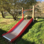 Large toboggan extérieur Hill Slide Wide SLW120 dans un parc verdoyant.