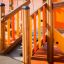 Rubik playhouse with slide structure en bois avec des éléments colorés