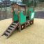 Structure d'escalade Tractor en forme de terrain de jeu avec toboggan sur surface en caoutchouc