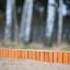 Sand edging pegs (running meter) utilisé pour créer une bordure soignée dans un jardin.