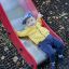 Enfant profitant de Fire-station playhouse with slide.