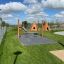 Aire de jeux Wigwam wooden house avec balançoires et toboggan