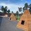 Wigwam wooden house sur une aire de jeux scolaire avec des arbres en arrière-plan