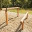 Équipement d’exercice extérieur 'Double Jump Bars' dans un cadre de parc.
