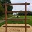 Step And Climb wooden ladder sur une aire de jeux.