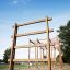 Step And Climb wooden ladder dans une aire de jeux extérieure.