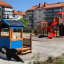 Twister castle with slide sur une aire de jeux moderne