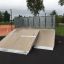 Quarter 2 - rampe de skateboard avec surface en bois dans un parc.