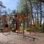 Structure de fitness extérieure New Age Fit MEDIUM dans un parc.