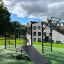 Équipement de fitness extérieur New Age Fit MEDIUM dans un parc.