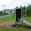 Équipement de fitness extérieur New Age Fit MEDIUM dans un parc.