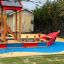 Équipements de terrain de jeux Fisher Boat ship dans une aire de jeux extérieure.